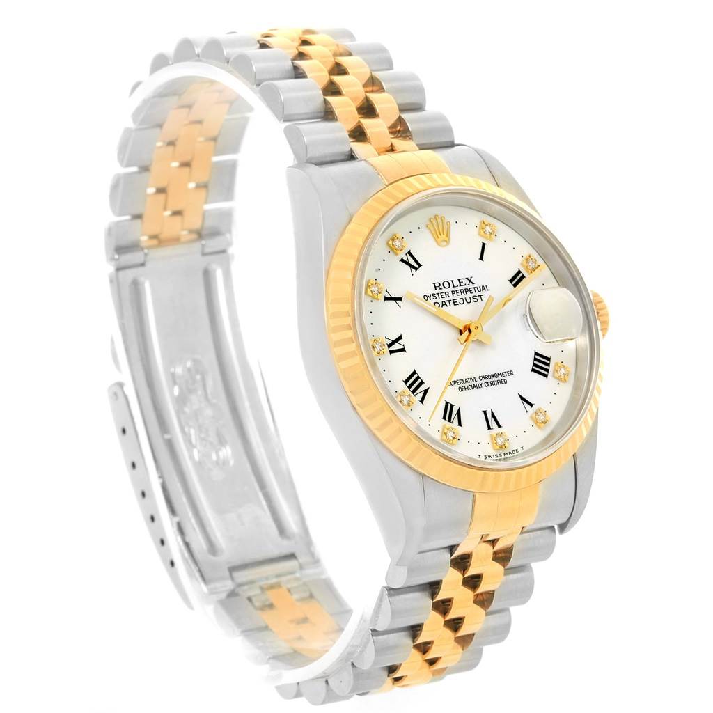 The Rolex Datejust 16233 Steel and Gold (two tone) White Dial 16233 Steel and Gold (two tone) White Dial watch is shown at a tilted angle, highlighting the face, bezel, and two-tone bracelet.