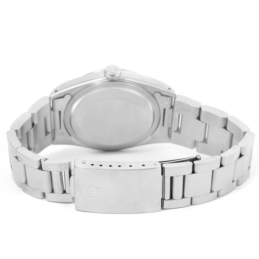 This image shows the Rolex Datejust 16234 Men's Stainless Steel Blue Dial 16234 Men's Stainless Steel Blue Dial watch from the back, highlighting the clasp, bracelet, and case back.