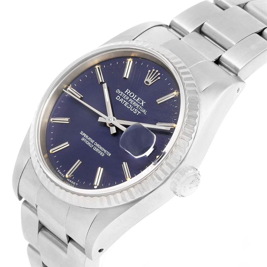 The image shows a close-up, angled view of the face, bezel, and part of the bracelet of a Rolex Datejust 16234 Men's Stainless Steel Blue Dial 16234 Men's Stainless Steel Blue Dial watch.