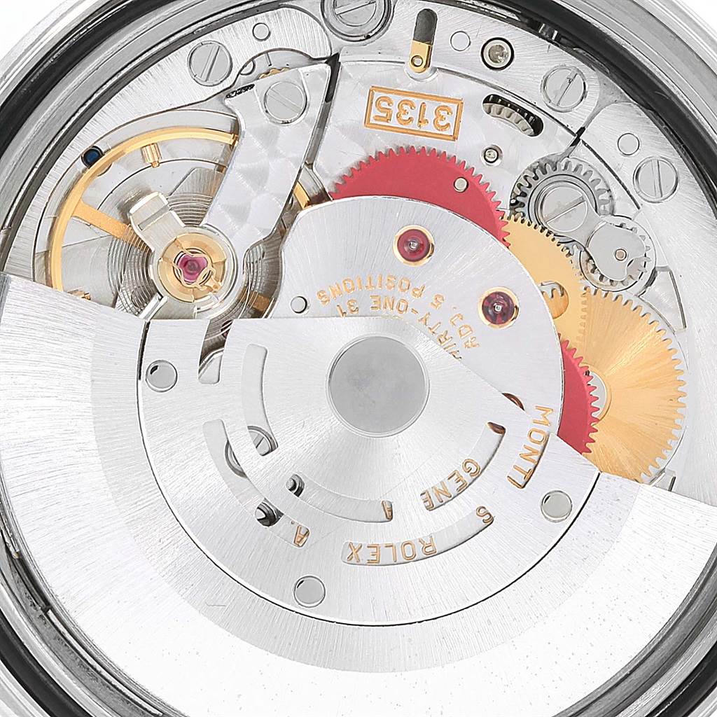 This is a close-up shot of the Rolex Datejust 16234 Men's Stainless Steel Black Dial 16234 Men's Stainless Steel Black Dial watch movement, showing intricate gears and mechanical components.