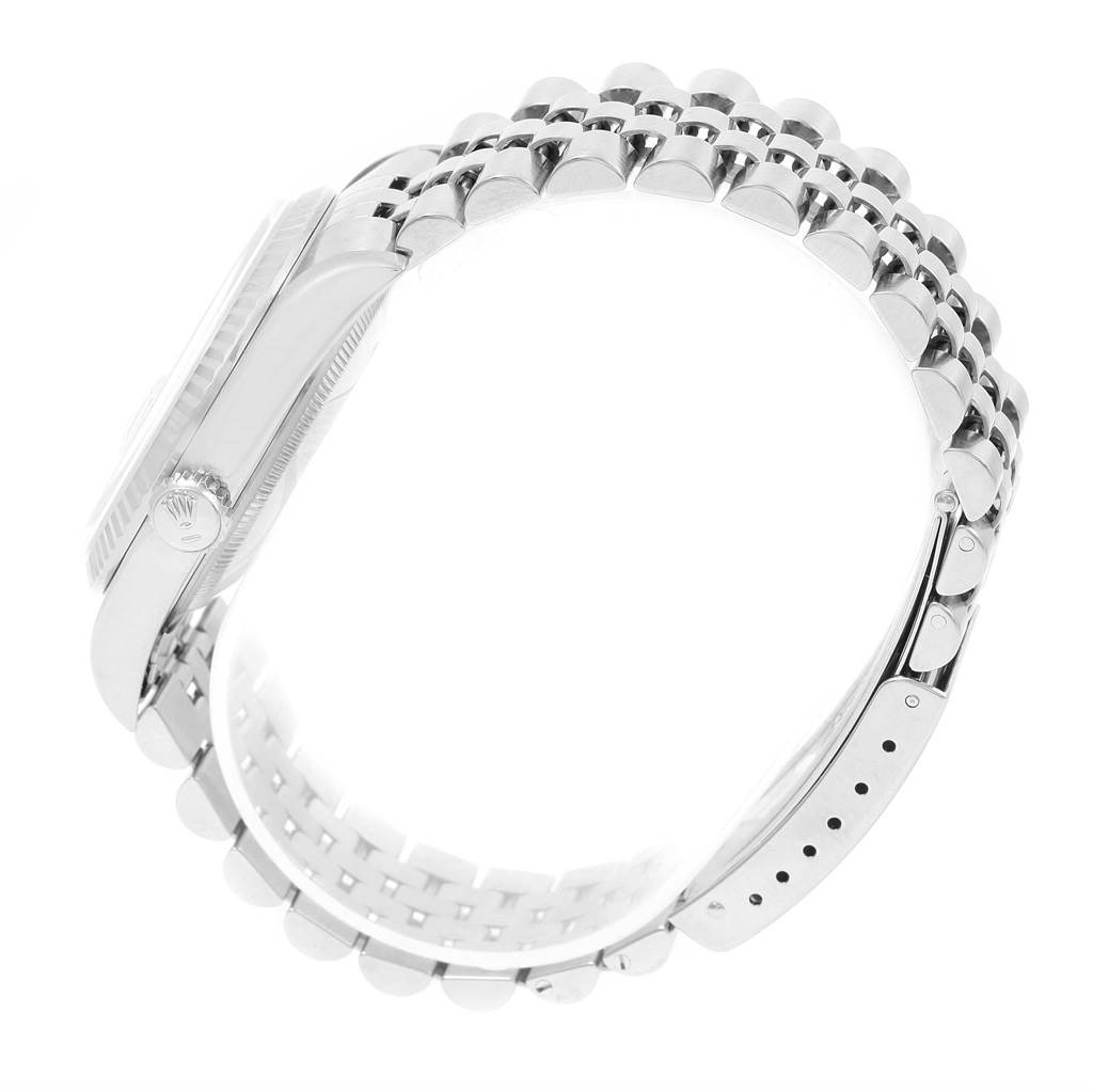 The image shows a Rolex Datejust 16234 Men's Stainless Steel Black Dial 16234 Men's Stainless Steel Black Dial watch from a side angle, focusing on the crown, case, and bracelet links.