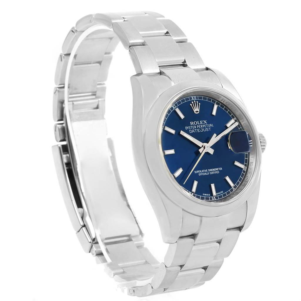 The Rolex Datejust 116200 Men's Stainless Steel Blue Dial 116200 Men's Stainless Steel Blue Dial watch is shown at an angled view highlighting its stainless steel bracelet, blue dial, and date feature.