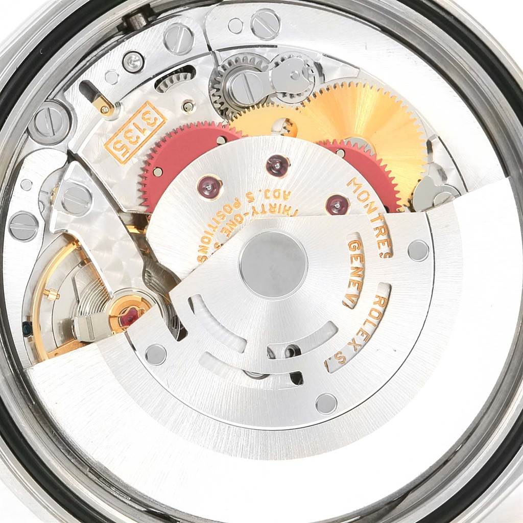 The image shows the intricate internal mechanism of a Rolex Datejust 16200 Men's Stainless Steel Silver Dial 16200 Men's Stainless Steel Silver Dial watch from a rear angle view.