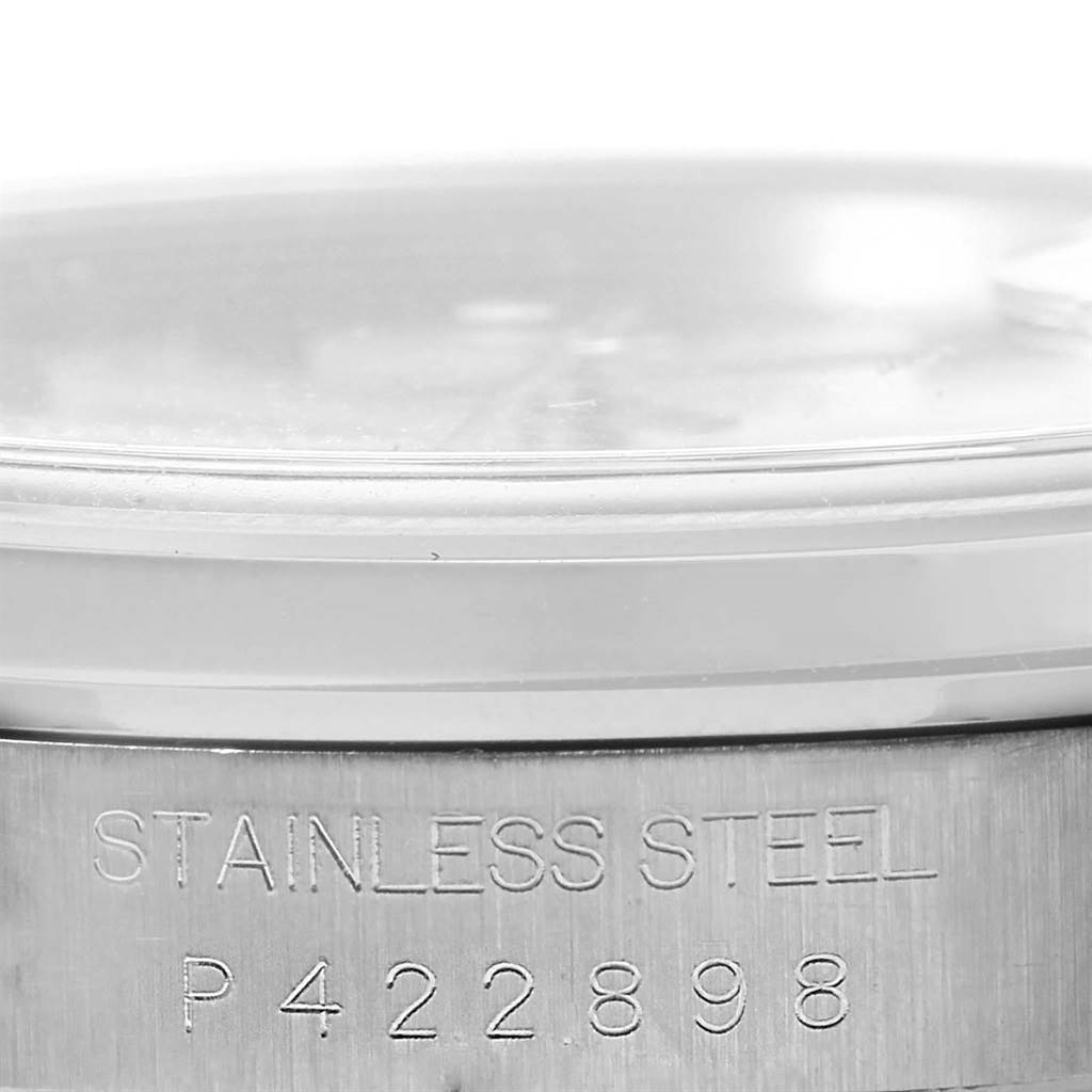 This image shows the side view of a Rolex Datejust 16200 Men's Stainless Steel Silver Dial 16200 Men's Stainless Steel Silver Dial watch, focusing on the stainless steel case with serial number P422898.