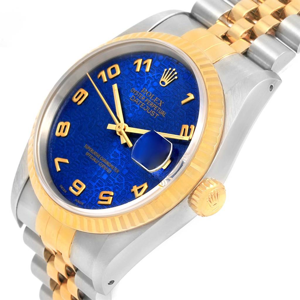 This image shows a side view of a Rolex Datejust 16233 Men's Steel and Gold (two tone) Blue Dial 16233 Men's Steel and Gold (two tone) Blue Dial watch, highlighting the blue dial, gold bezel, and part of the bracelet.