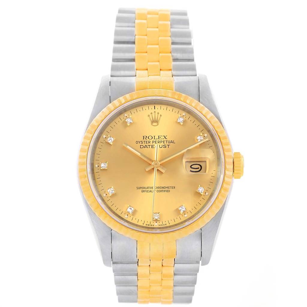 The image shows a Rolex Datejust 16013 Stainless Steel Champagne Dial 16013 Stainless Steel Champagne Dial watch front view, highlighting its gold dial, bezel, and two-tone bracelet.