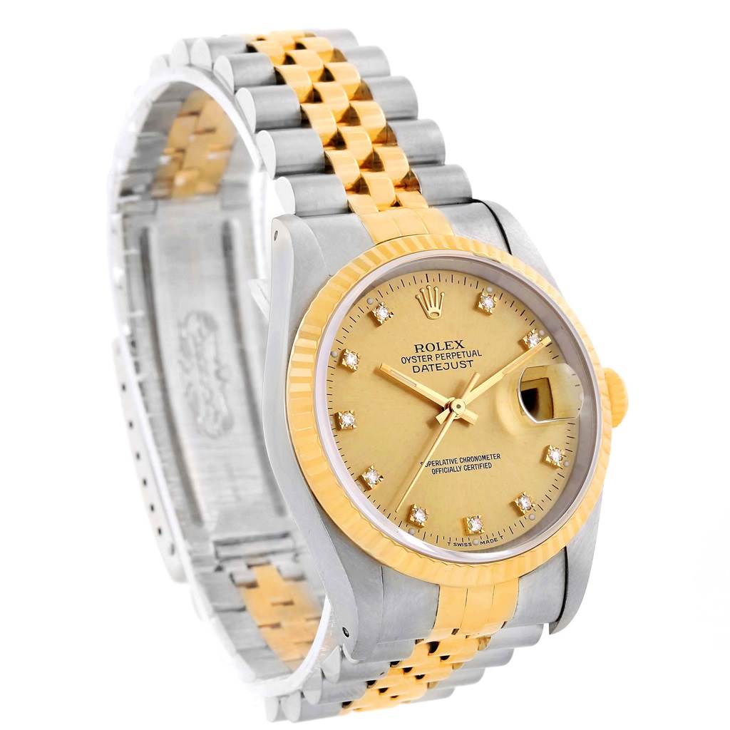 This image shows a Rolex Datejust 16013 Stainless Steel Champagne Dial 16013 Stainless Steel Champagne Dial watch angled to display the face, bezel, and bracelet.
