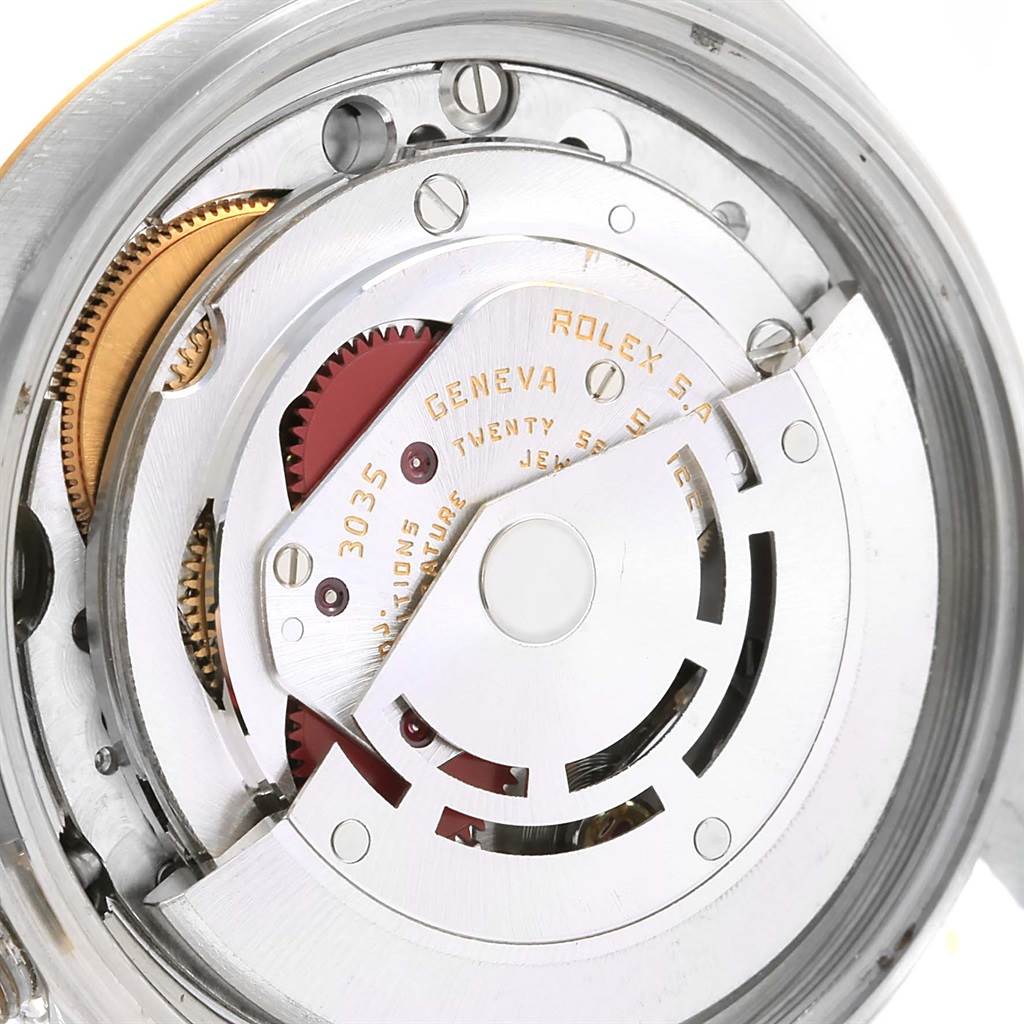 This image shows a close-up view of the internal movement mechanism of a Rolex Datejust 16013 Men's Stainless Steel Champagne Dial 16013 Men's Stainless Steel Champagne Dial watch.