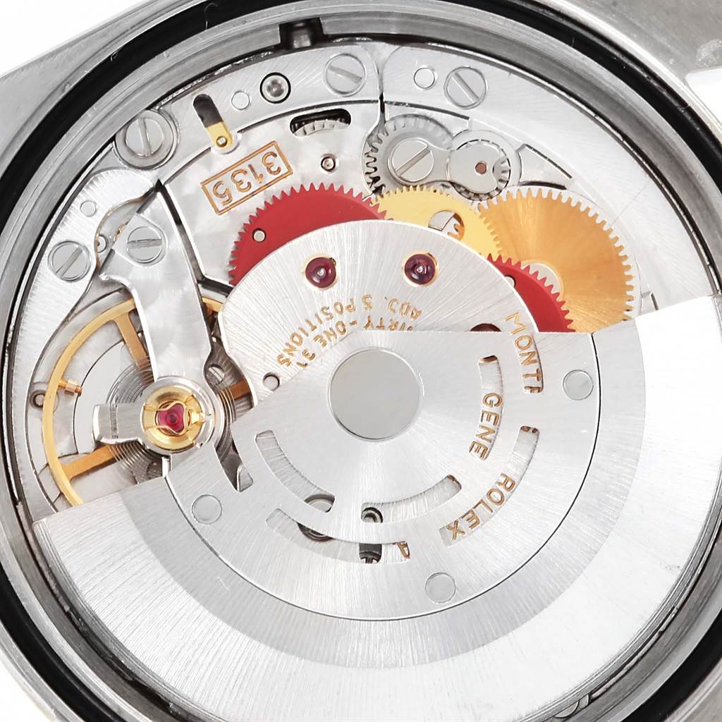 This close-up image shows the intricate internal mechanism of the Rolex Datejust 16233 Men's Steel and Gold (two tone) Champagne Dial 16233 Men's Steel and Gold (two tone) Champagne Dial watch.
