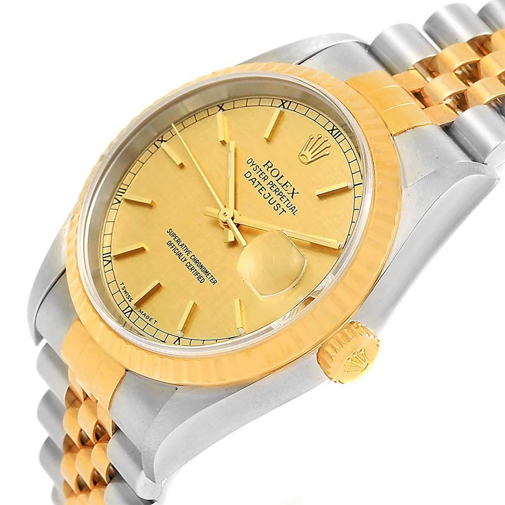 The image shows a side angle of the Rolex Datejust 16233 Men's Steel and Gold (two tone) Champagne Dial 16233 Men's Steel and Gold (two tone) Champagne Dial watch showcasing its dial, bezel, crown, and bracelet.