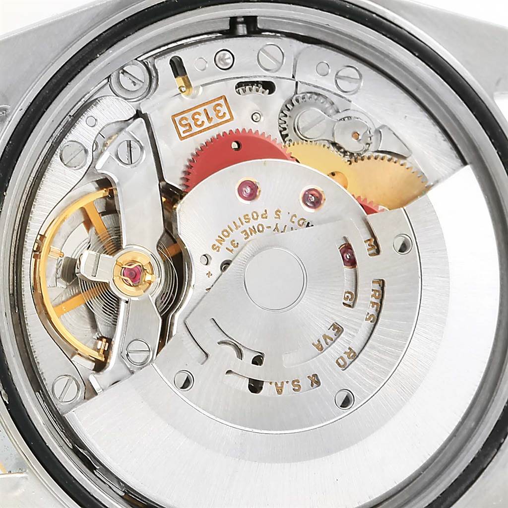 This image shows the internal mechanism and movement parts of a Rolex Datejust 16233 Men's Steel and Gold (two tone) White Dial 16233 Men's Steel and Gold (two tone) White Dial watch from a close-up angle.
