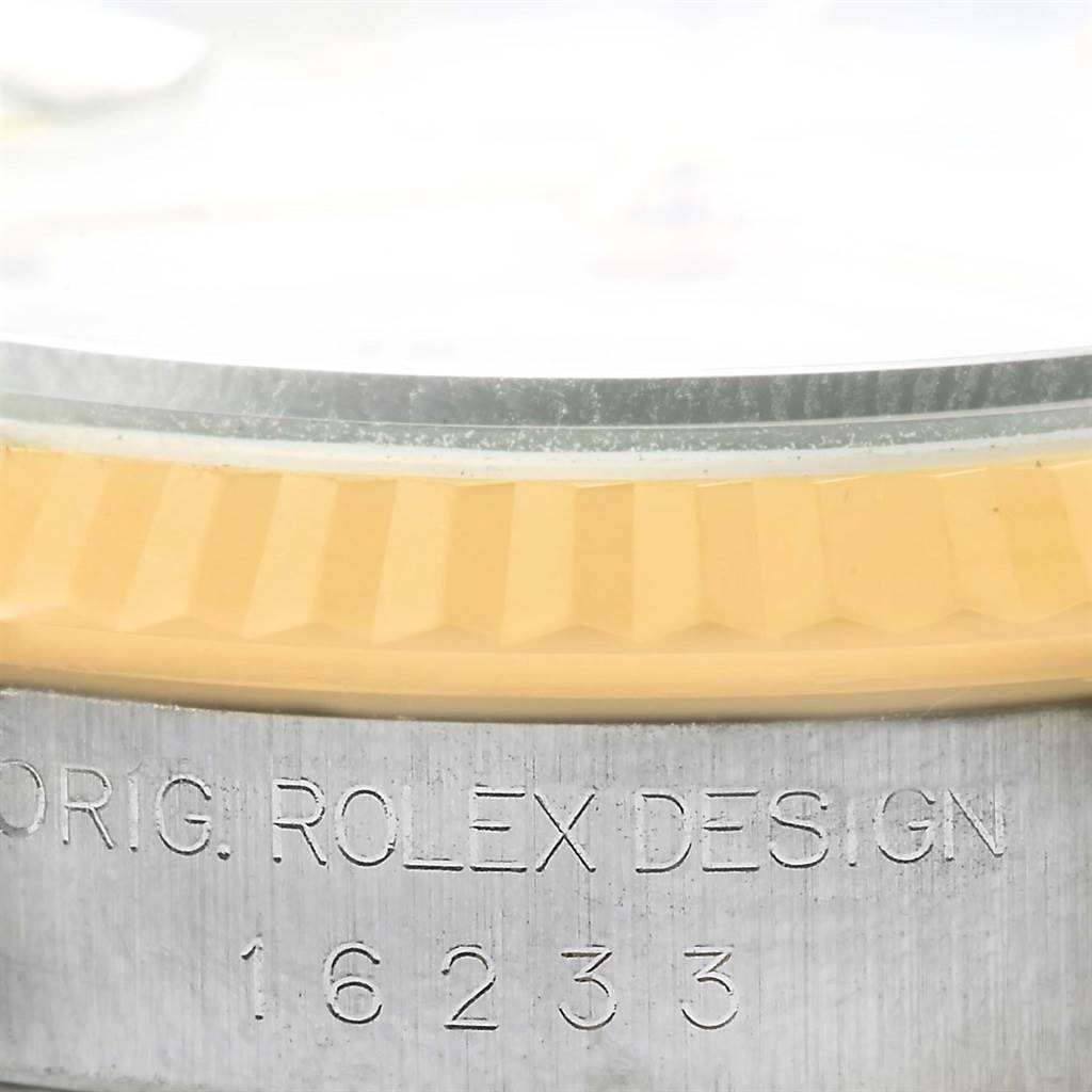 This close-up image shows the side profile of a Rolex Datejust 16233 Men's Steel and Gold (two tone) White Dial 16233 Men's Steel and Gold (two tone) White Dial watch, specifically highlighting the model number 16233 and the inscription "ORIG. ROLEX DESIGN."