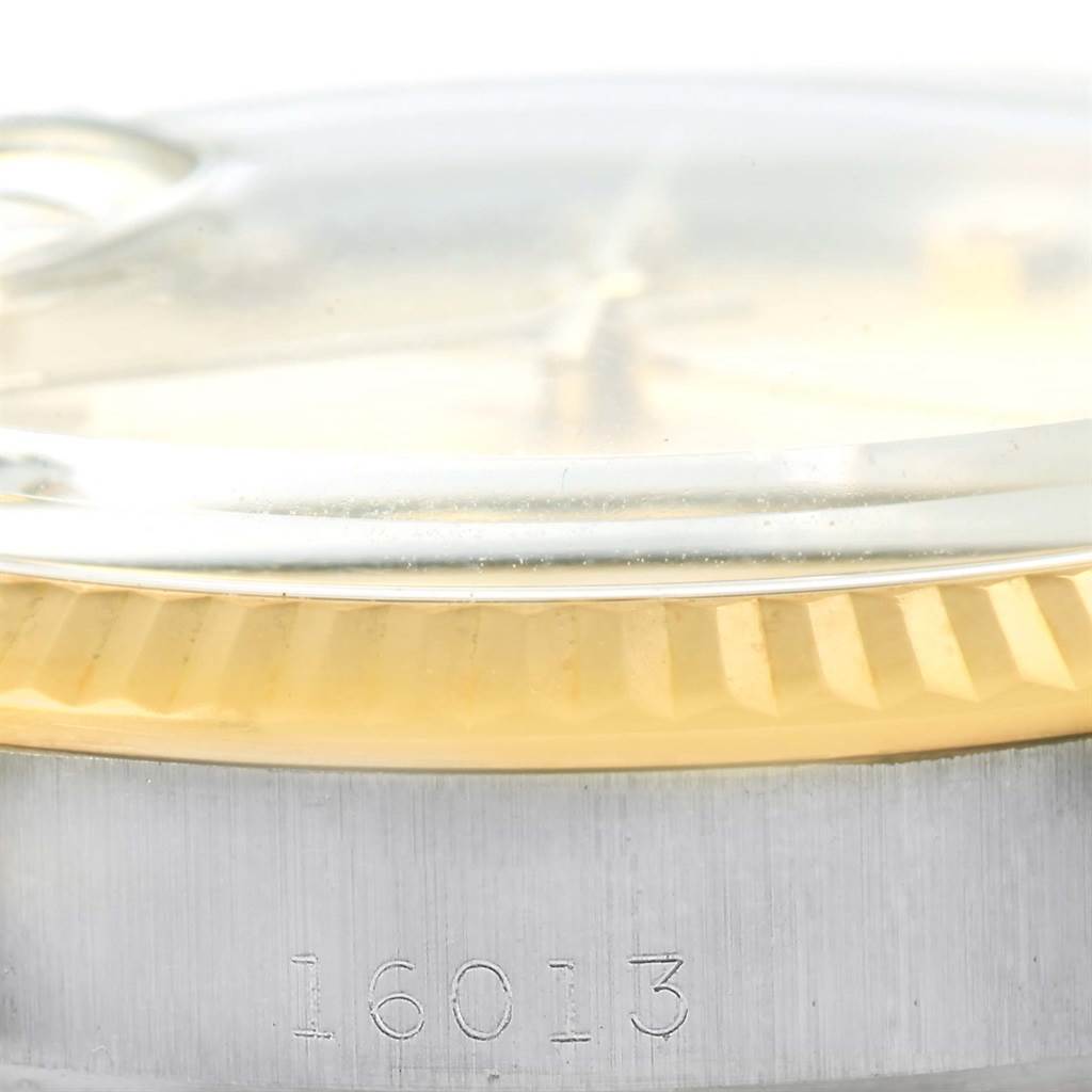 The image shows a side view of a Rolex Datejust 16013 Men's Stainless Steel Champagne Dial 16013 Men's Stainless Steel Champagne Dial model, focusing on the bezel, crystal, and case, with the model number 16013 visible.