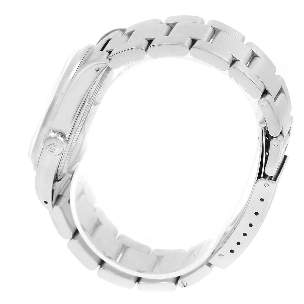 The image shows a side view of a Rolex Datejust 16200 Men's Stainless Steel Silver Dial 16200 Men's Stainless Steel Silver Dial watch, highlighting its metallic bracelet, case, and crown.