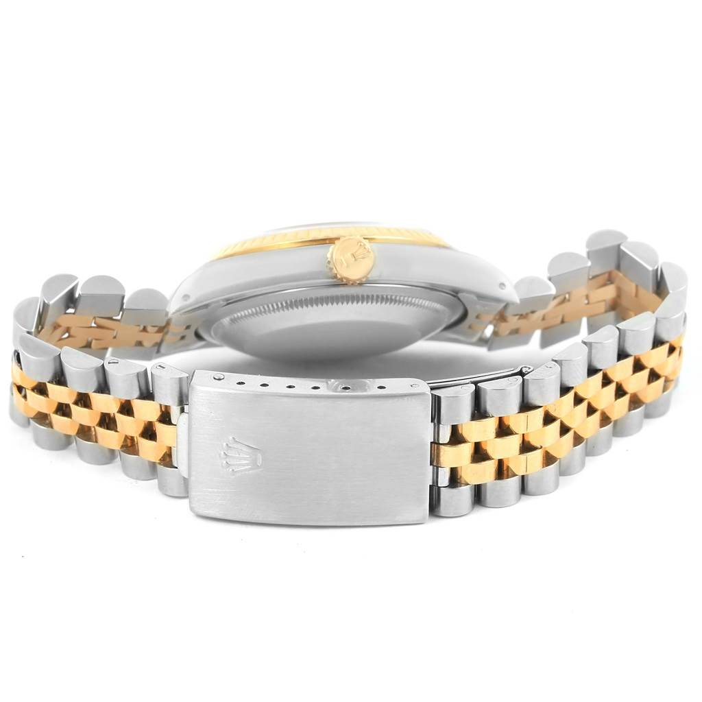 The image shows the back view and bracelet of a Rolex Datejust 16233 Men's Steel and Gold (two tone) Black Dial 16233 Men's Steel and Gold (two tone) Black Dial watch, highlighting the clasp and two-tone metal links.