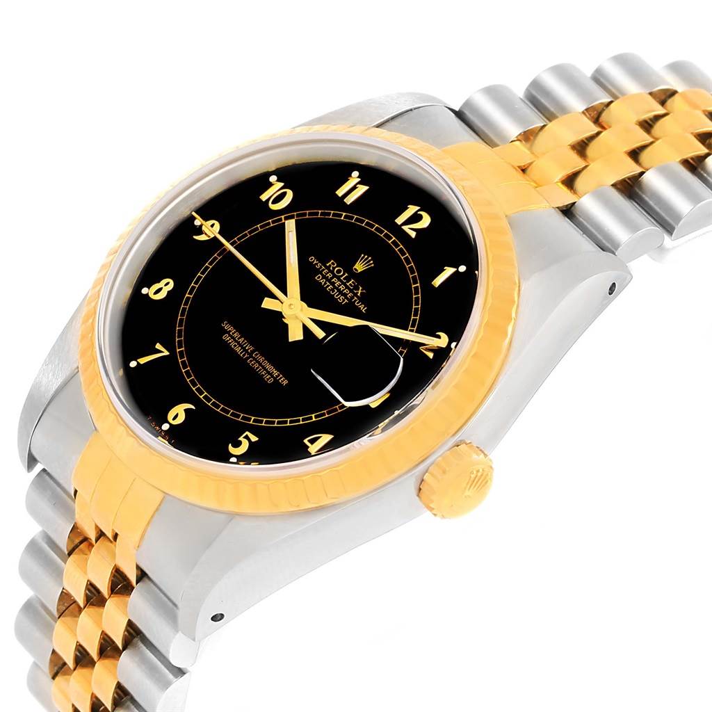 This Rolex Datejust 16233 Men's Steel and Gold (two tone) Black Dial 16233 Men's Steel and Gold (two tone) Black Dial watch is viewed from an angled side, showing its gold bezel, crown, and bi-metal bracelet.