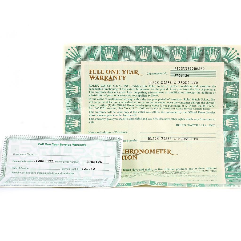 This image shows the warranty and service papers for a Rolex Datejust 16233 Men's Steel and Gold (two tone) Black Dial 16233 Men's Steel and Gold (two tone) Black Dial model watch.