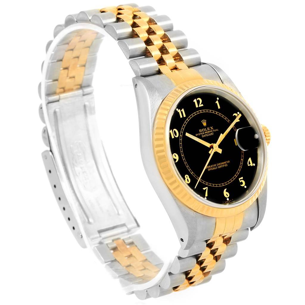 The image shows the Rolex Datejust 16233 Men's Steel and Gold (two tone) Black Dial 16233 Men's Steel and Gold (two tone) Black Dial watch at an angled view, highlighting its dial, bezel, and two-tone bracelet.