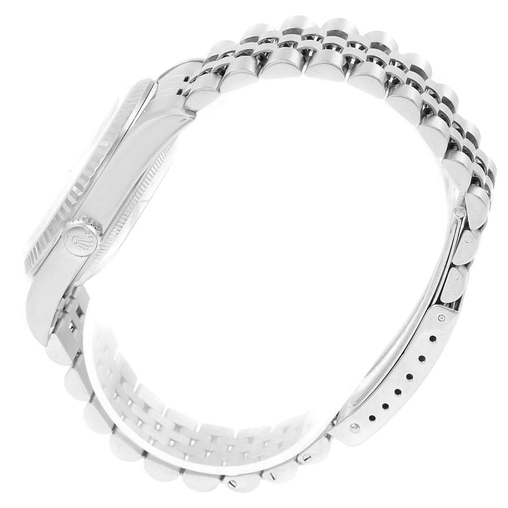 The image shows a side view of a Rolex Datejust 16234 Men's Stainless Steel Silver Dial 16234 Men's Stainless Steel Silver Dial watch focusing on the case and Jubilee bracelet.