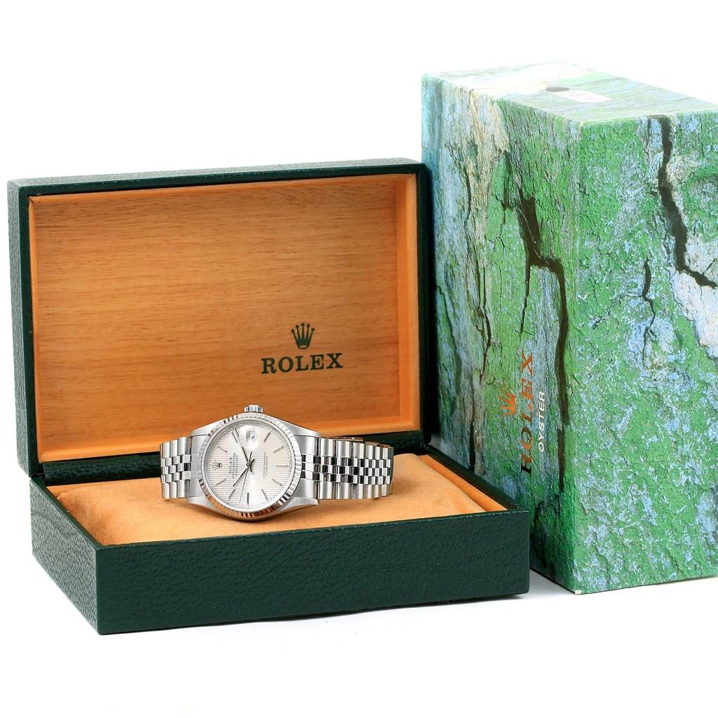 The image shows a Rolex Datejust 16234 Men's Stainless Steel Silver Dial 16234 Men's Stainless Steel Silver Dial watch in a green and wooden Rolex box, viewed from the front angle.