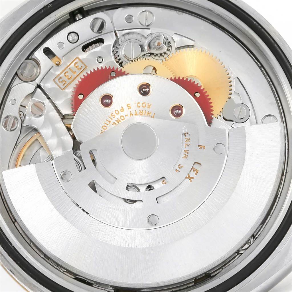 The image shows the movement and internal components of the Rolex Datejust 116233 Men's Stainless Steel White Dial 116233 Men's Stainless Steel White Dial watch viewed from the back.