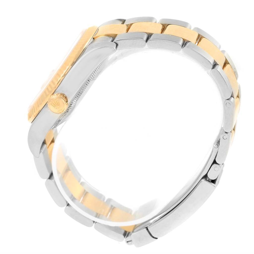 The image shows the side view of a Rolex Datejust 116233 Men's Stainless Steel White Dial 116233 Men's Stainless Steel White Dial model, highlighting its two-tone bracelet and crown.