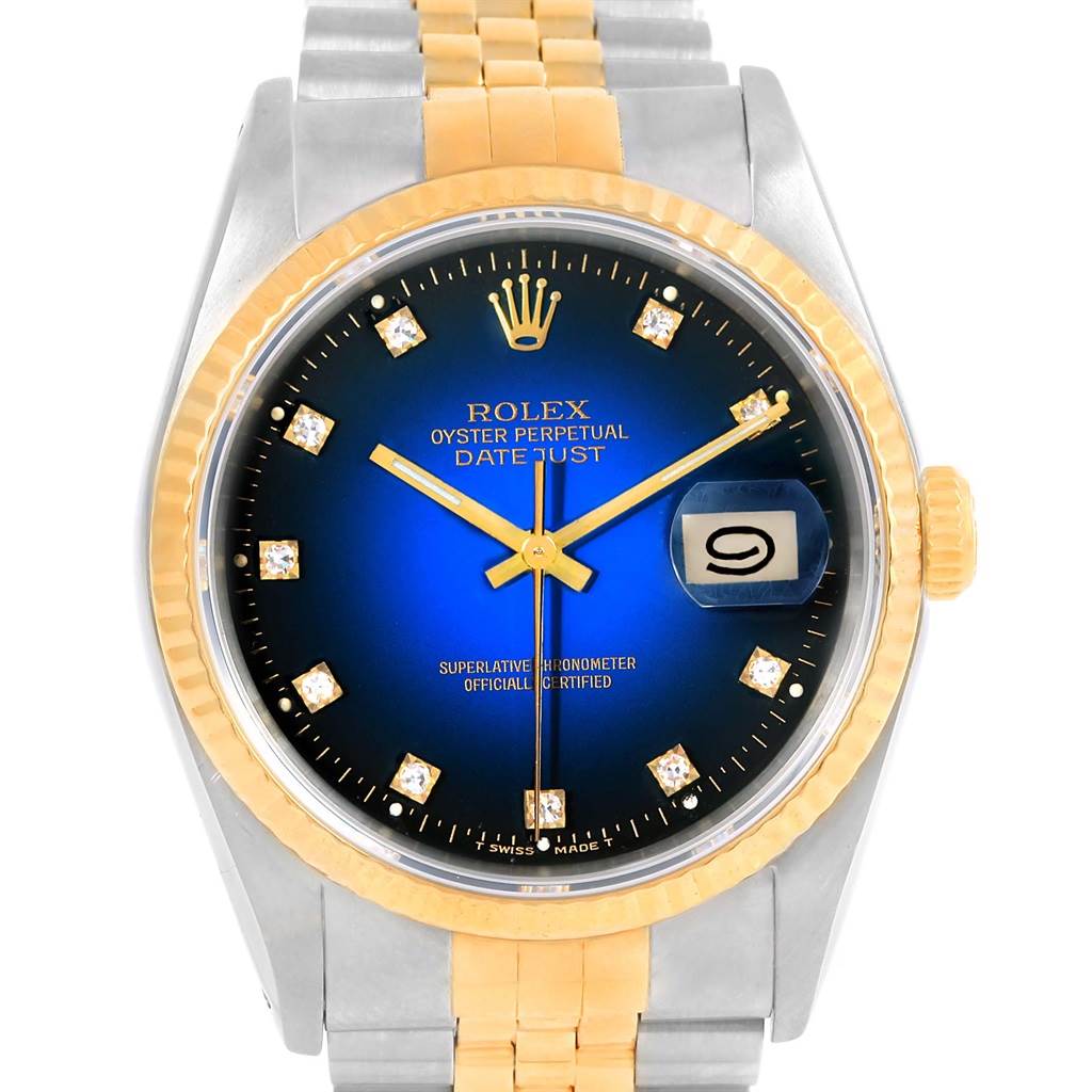 The image shows a front view of a Rolex Datejust 16233 Men's Steel and Gold (two tone) Blue Dial 16233 Men's Steel and Gold (two tone) Blue Dial watch, highlighting the blue dial, fluted gold bezel, and date window.