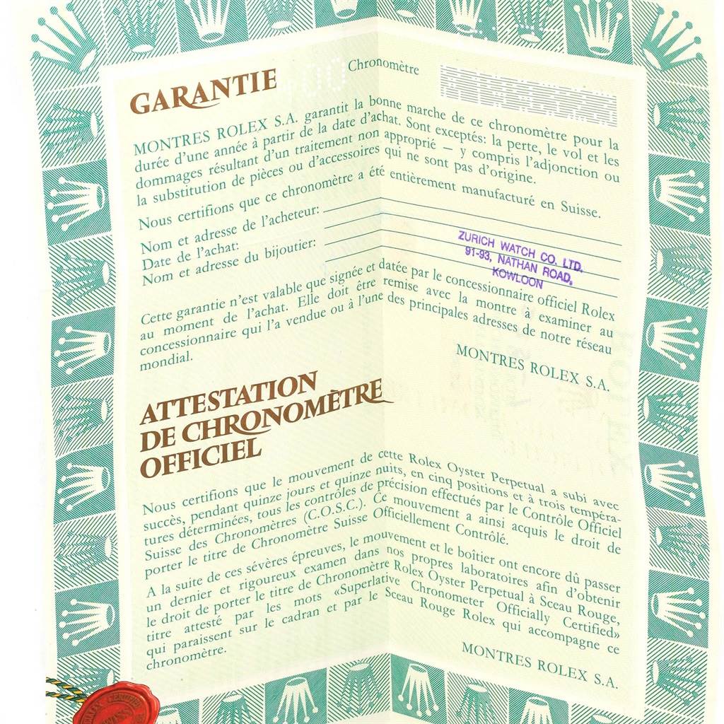 This image shows a warranty and chronometer certificate for a Rolex Datejust 16233 Men's Steel and Gold (two tone) Blue Dial 16233 Men's Steel and Gold (two tone) Blue Dial watch.