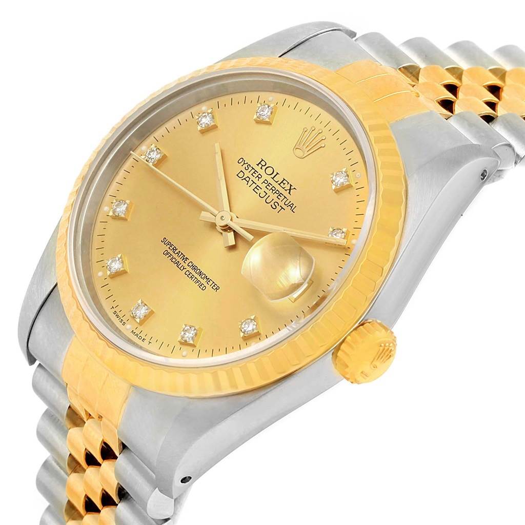 The image shows a close-up angled view of the Rolex Datejust 16233 Steel and Gold (two tone) Champagne Dial 16233 Steel and Gold (two tone) Champagne Dial watch, displaying its gold dial, bezel, and part of the bracelet.