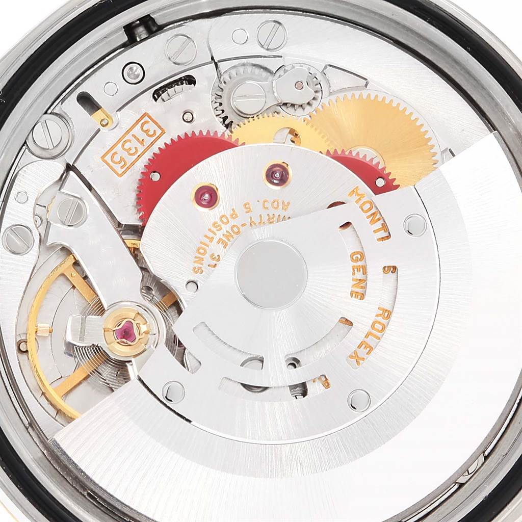 This image shows a close-up view of the movement mechanism inside the Rolex Datejust 16233 Steel and Gold (two tone) Champagne Dial 16233 Steel and Gold (two tone) Champagne Dial watch.