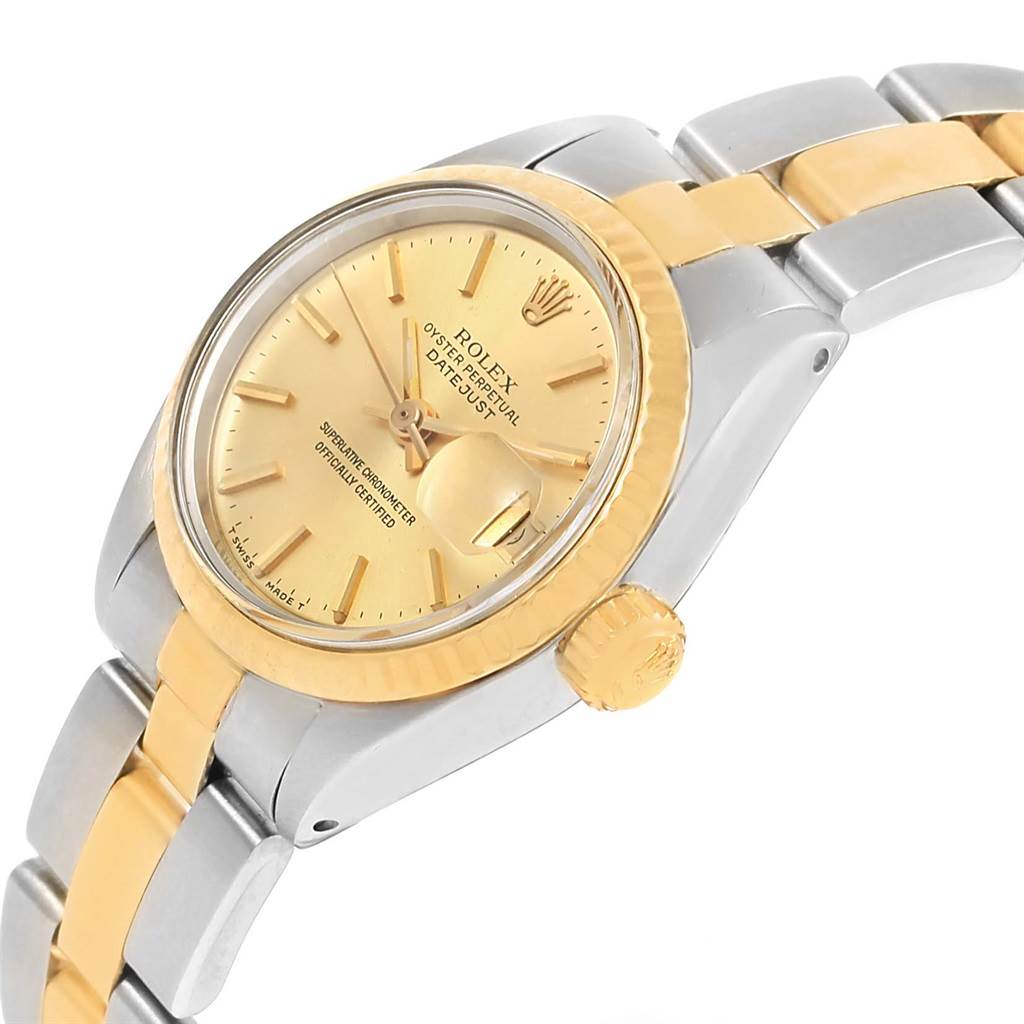 This image shows a side angle of a Rolex Datejust 6917 Women's Stainless Steel Champagne Dial 6917 Women's Stainless Steel Champagne Dial watch, highlighting the dial, crown, and part of the bracelet.