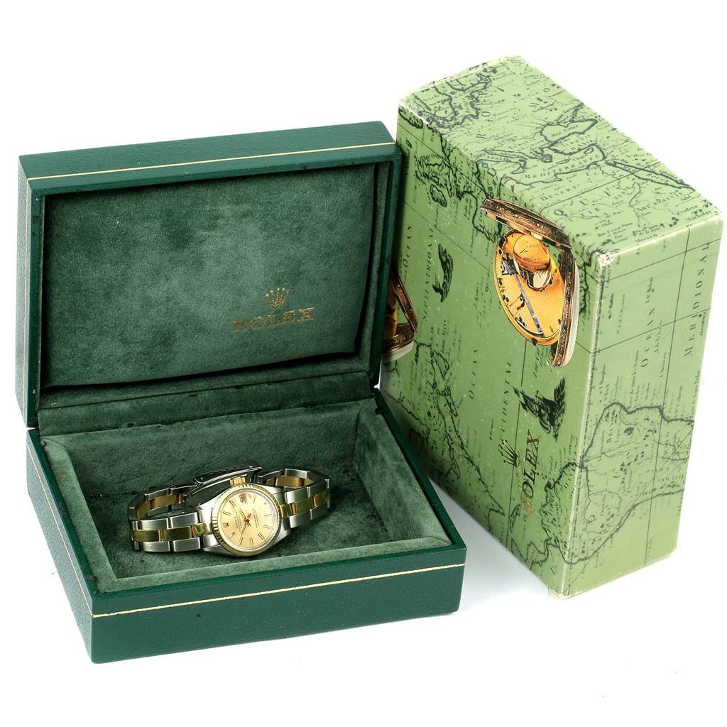 The image shows a Rolex Datejust 6917 Women's Stainless Steel Champagne Dial 6917 Women's Stainless Steel Champagne Dial watch in its open green display box, alongside the Rolex-branded outer box.