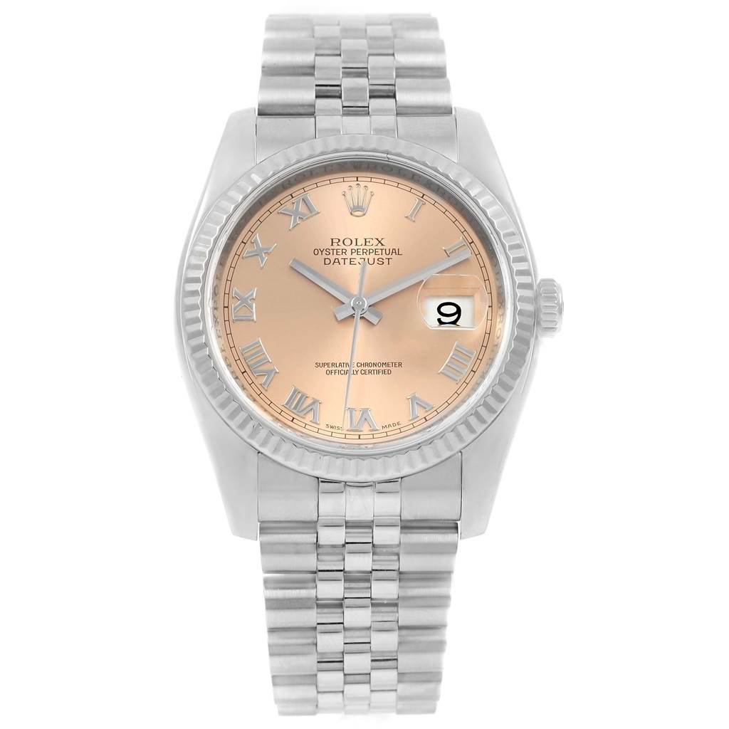 The image shows a Rolex Datejust 116234 Stainless Steel Pink Dial 116234 Stainless Steel Pink Dial watch with a pink dial, Roman numerals, and a Jubilee bracelet from a frontal angle.