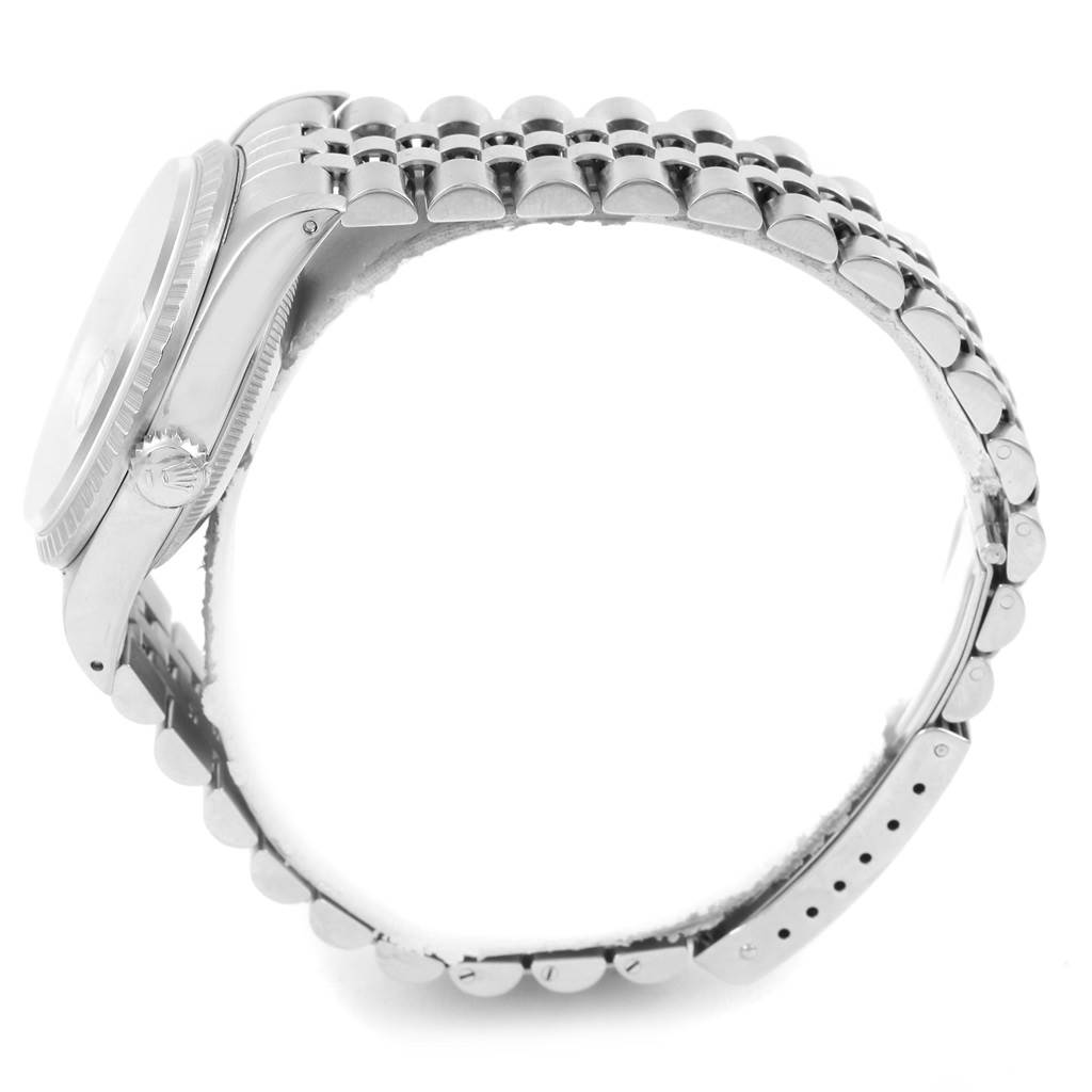 The image displays a side view of the Rolex Datejust 16220 Men's Stainless Steel Silver Dial 16220 Men's Stainless Steel Silver Dial watch, showcasing the bezel, case, crown, and bracelet.