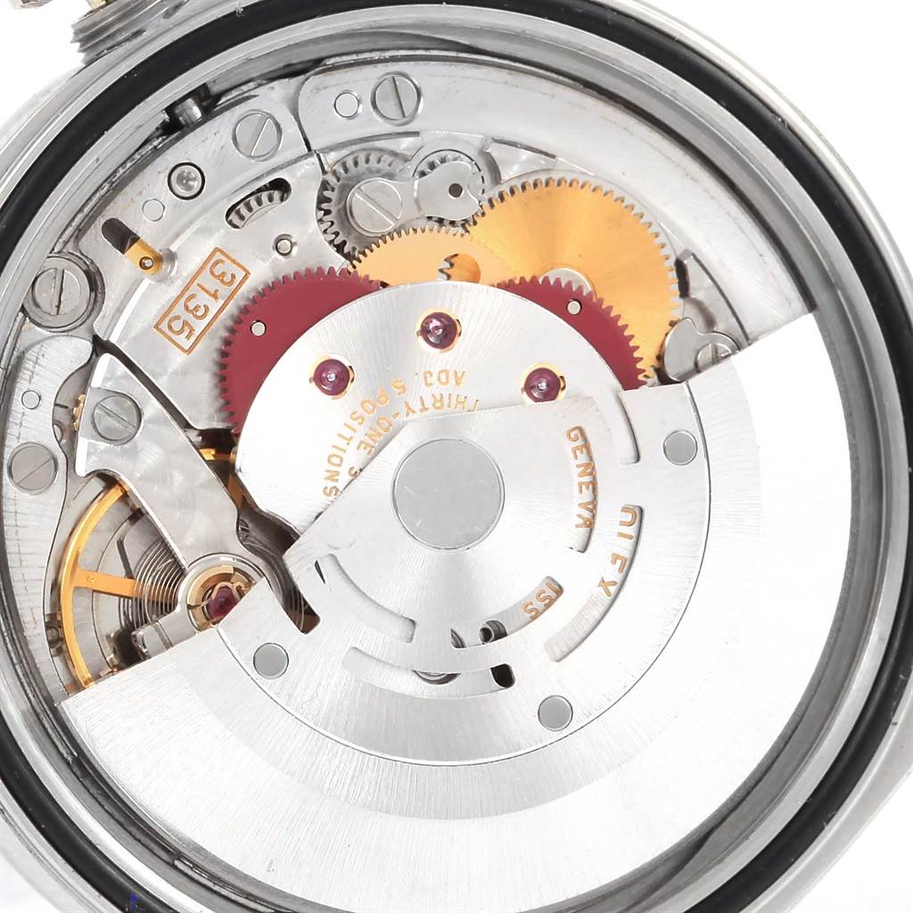 This image shows the inner movement mechanism of a Rolex Datejust 16220 Men's Stainless Steel Silver Dial 16220 Men's Stainless Steel Silver Dial watch at a close-up angle.