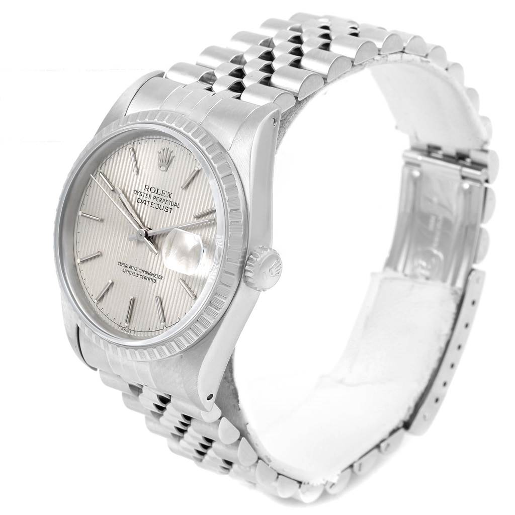 The image shows a silver Rolex Datejust 16220 Men's Stainless Steel Silver Dial 16220 Men's Stainless Steel Silver Dial watch from an angled view, displaying its face and part of the metal bracelet.