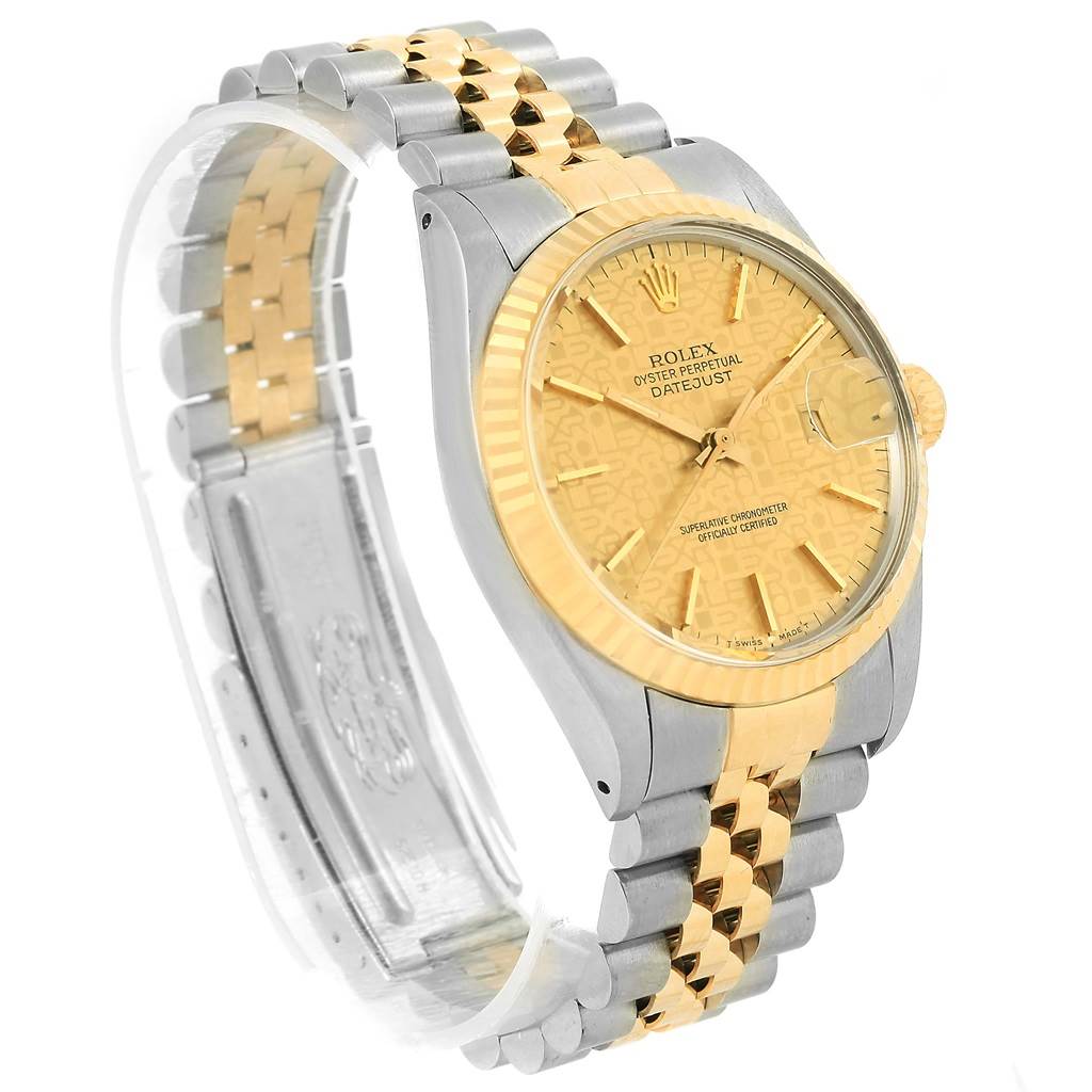 The Rolex Datejust 16013 Men's Stainless Steel Champagne Dial 16013 Men's Stainless Steel Champagne Dial watch is shown at a three-quarter angle, highlighting its face, bezel, bracelet, and clasp.