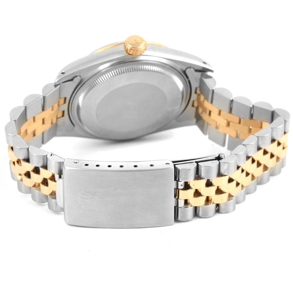 The image shows the back view of the Rolex Datejust 16013 Men's Stainless Steel Champagne Dial 16013 Men's Stainless Steel Champagne Dial watch, highlighting the case back, crown, and the two-tone Jubilee bracelet with clasp.