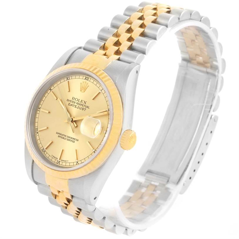 The image shows a Rolex Datejust 16233 Men's Steel and Gold (two tone) Champagne Dial 16233 Men's Steel and Gold (two tone) Champagne Dial watch angled slightly to the left, highlighting the gold dial, bezel, crown, and two-tone bracelet.