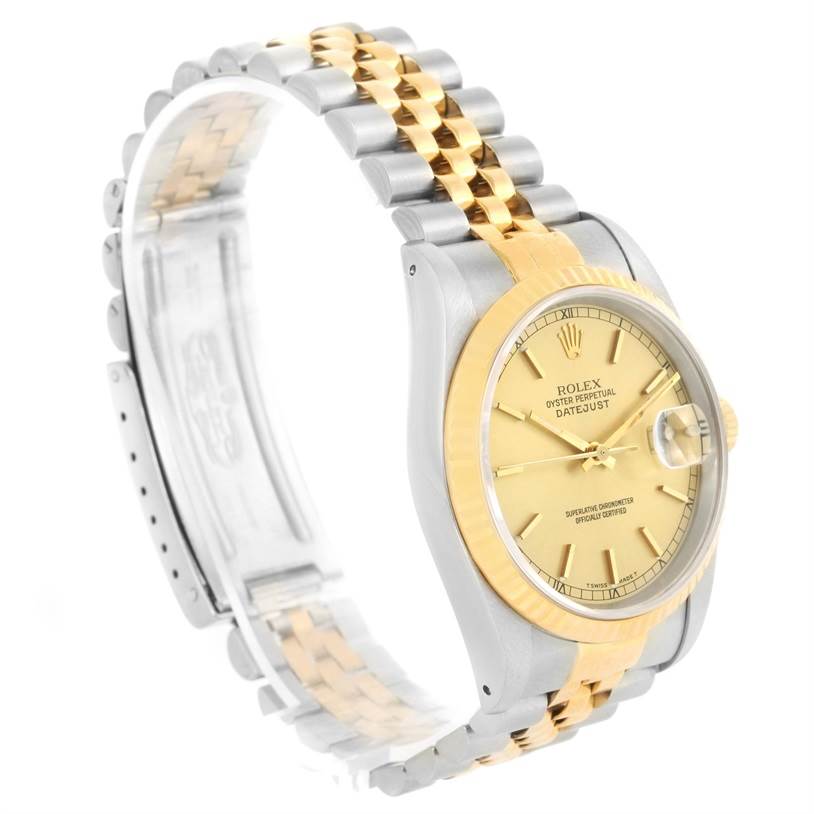 This image shows a Rolex Datejust 16233 Men's Steel and Gold (two tone) Champagne Dial 16233 Men's Steel and Gold (two tone) Champagne Dial watch from a three-quarter angle, highlighting the face, bezel, and two-tone bracelet.