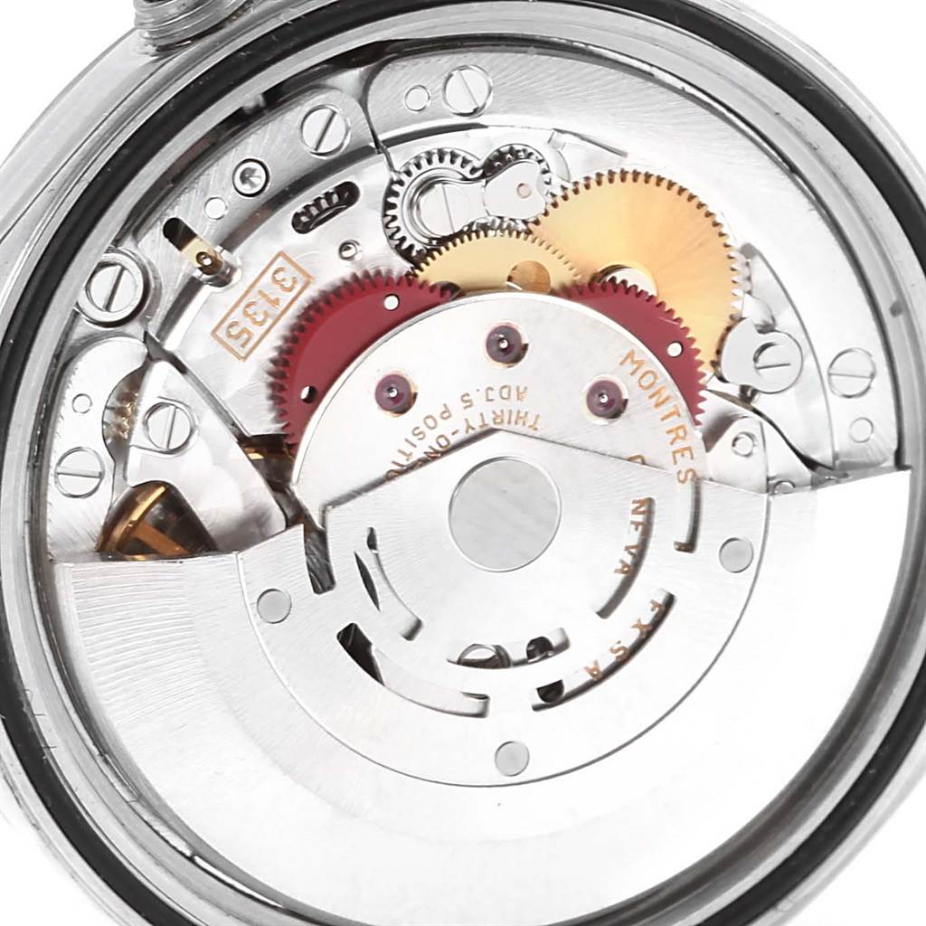 This image shows the internal movement and gears of a Rolex Datejust 16234 Men's Stainless Steel Silver Dial 16234 Men's Stainless Steel Silver Dial watch from a rear angle.