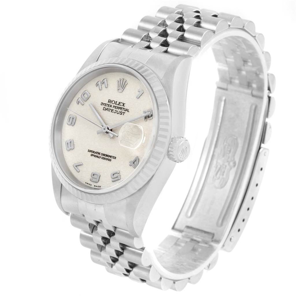 This image shows a Rolex Datejust 16234 Men's Stainless Steel Beige Dial 16234 Men's Stainless Steel Beige Dial model watch angled to display its face, bezel, crown, and part of the Jubilee bracelet.
