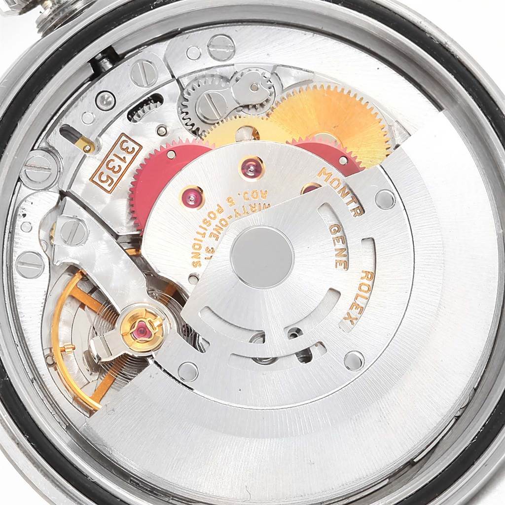 This image shows a close-up of the movement mechanism of the Rolex Datejust 16234 Men's Stainless Steel Beige Dial 16234 Men's Stainless Steel Beige Dial watch from the back.