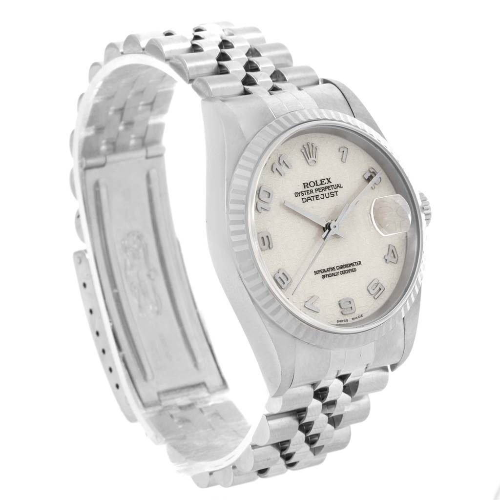The image shows a Rolex Datejust 16234 Men's Stainless Steel Beige Dial 16234 Men's Stainless Steel Beige Dial watch at an angle displaying the face, bezel, and bracelet open.