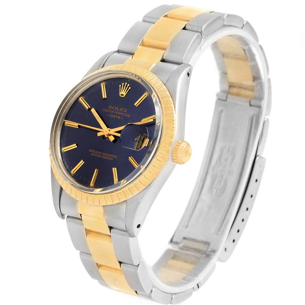 This image shows a Rolex Datejust 15053 Men's Steel and Gold (two tone) Blue Dial 15053 Men's Steel and Gold (two tone) Blue Dial watch at a three-quarter angle, highlighting the blue dial, the gold and silver bracelet, and the fluted bezel.