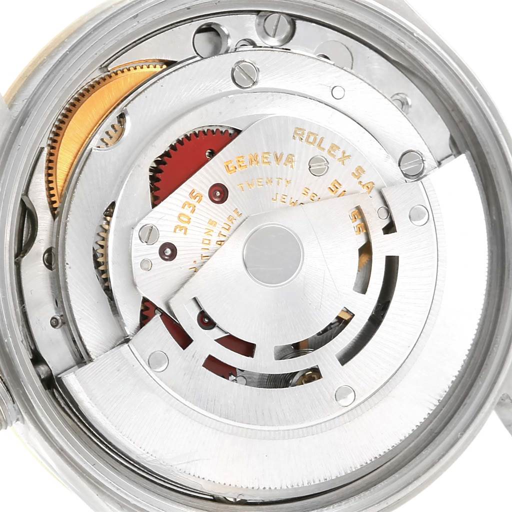 This is a close-up view of the Rolex Datejust 15053 Men's Steel and Gold (two tone) Blue Dial 15053 Men's Steel and Gold (two tone) Blue Dial watch movement, showcasing its internal mechanical components.