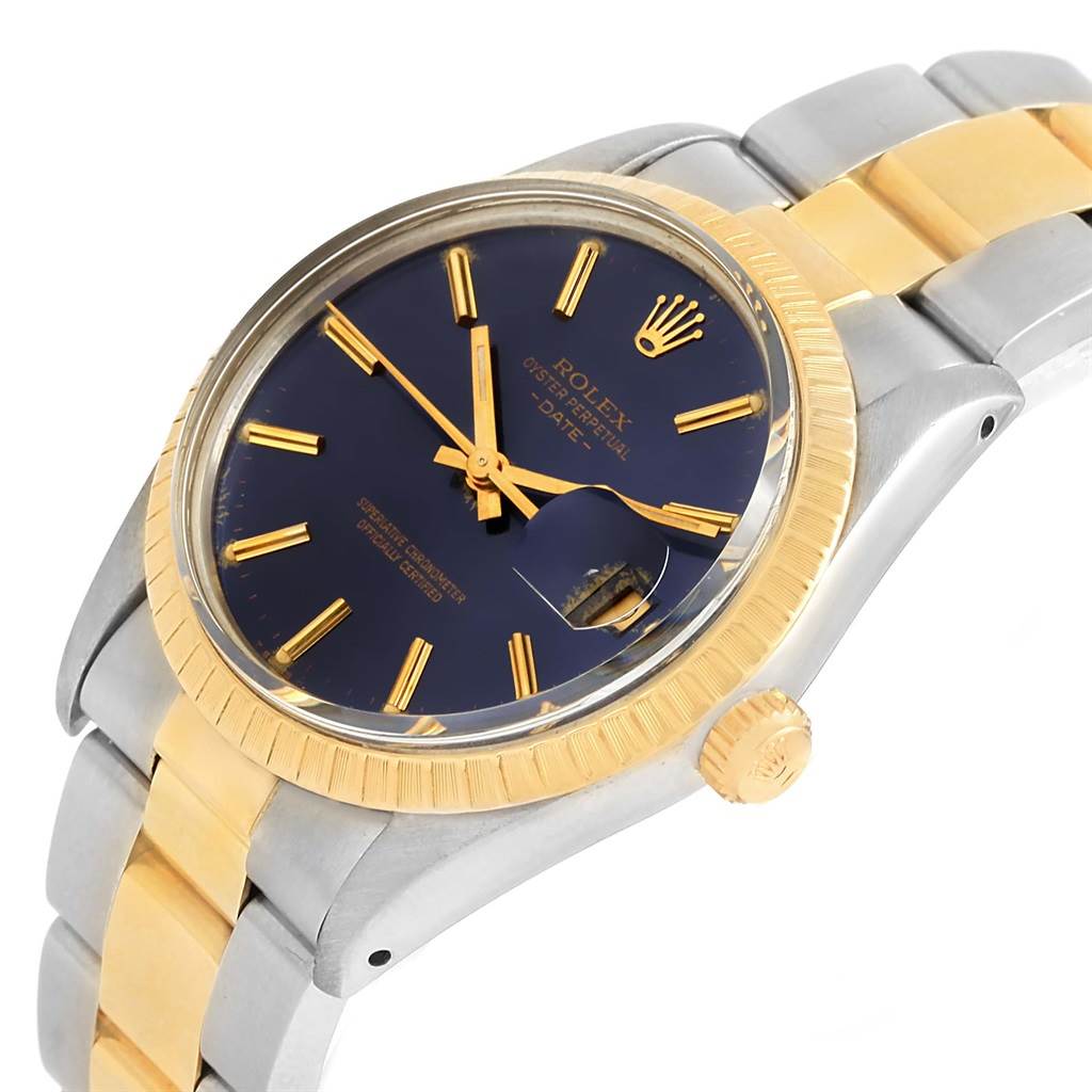 This image shows a Rolex Datejust 15053 Men's Steel and Gold (two tone) Blue Dial 15053 Men's Steel and Gold (two tone) Blue Dial watch featuring a blue dial, gold markers, date magnifier, and a two-tone bracelet angled slightly from above.