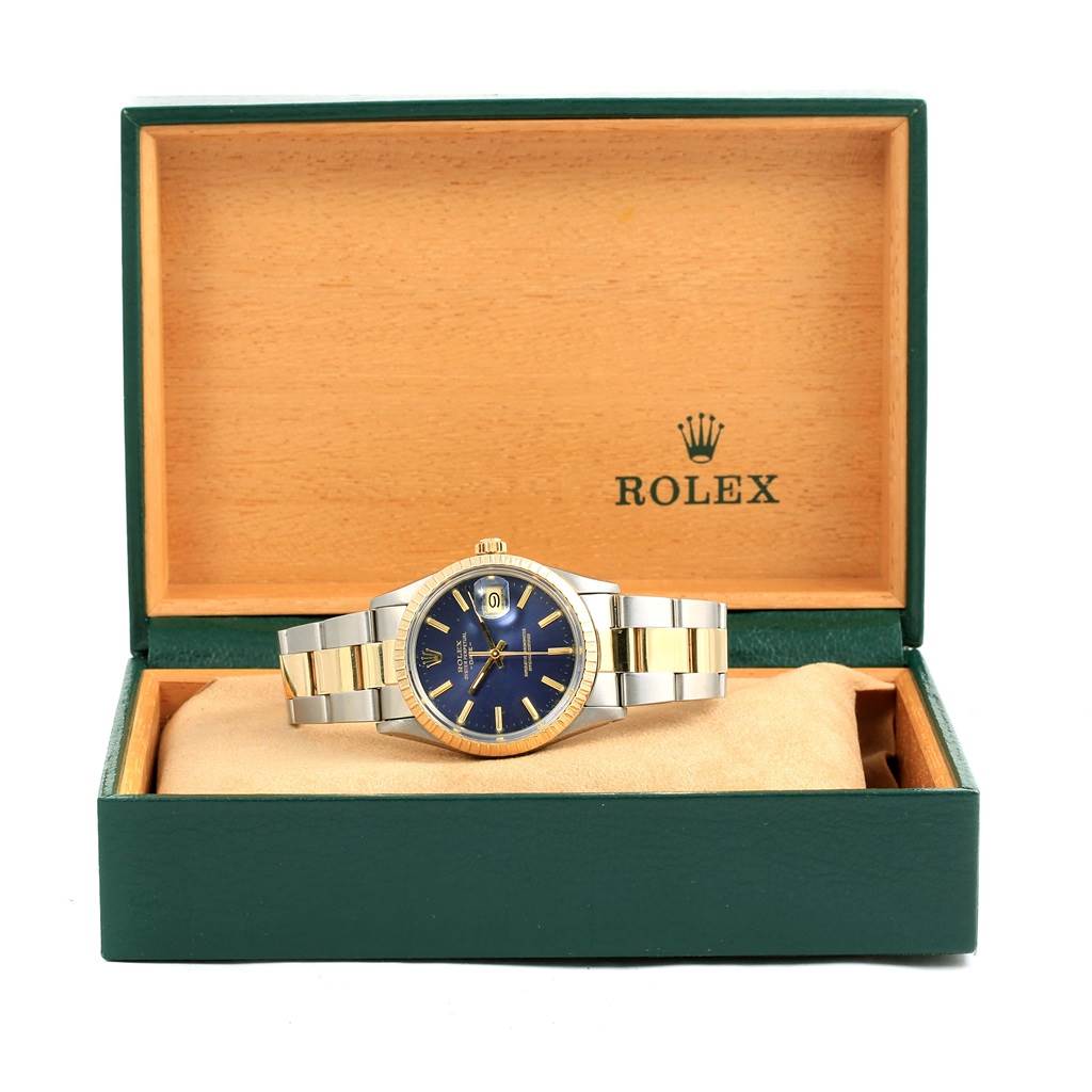 The Rolex Datejust 15053 Men's Steel and Gold (two tone) Blue Dial 15053 Men's Steel and Gold (two tone) Blue Dial watch is shown from the front, displaying the dial and bracelet inside its open box.