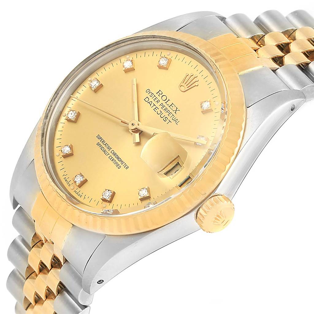 The image shows a close-up, angled view of a Rolex Datejust 16013 Men's Stainless Steel Champagne Dial 16013 Men's Stainless Steel Champagne Dial watch, highlighting its gold dial, bezel, and two-tone bracelet.