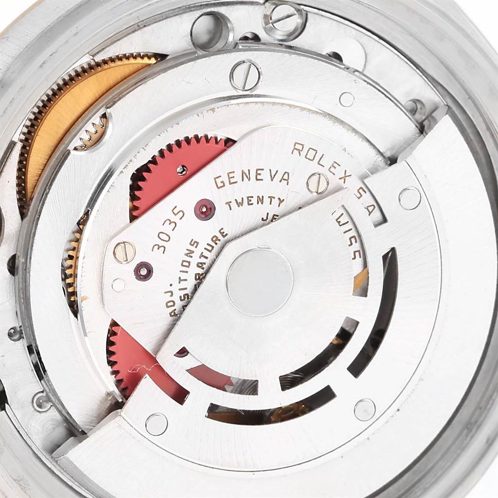 This image shows the intricate mechanical movement of a Rolex Datejust 16013 Men's Stainless Steel Champagne Dial 16013 Men's Stainless Steel Champagne Dial watch from a close-up angle.